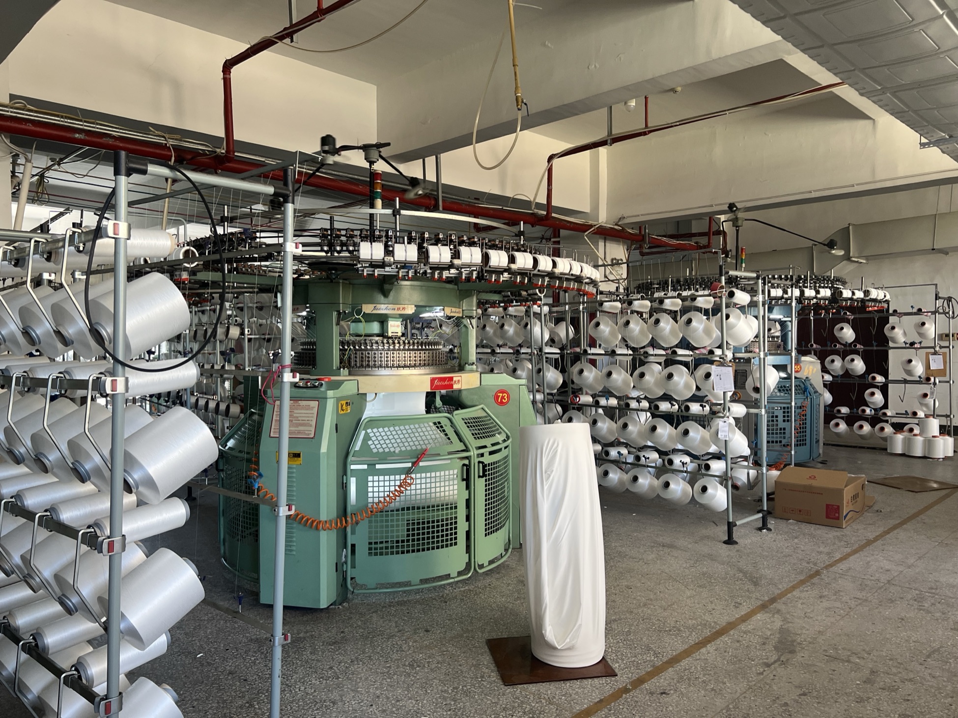 Circular knitting machine production floor at Manxianghong Knitting